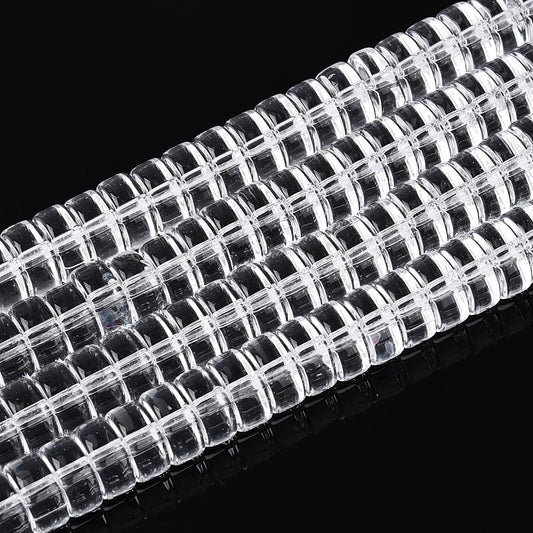 Clear flat round glass beads strand with square cut holes, close-up