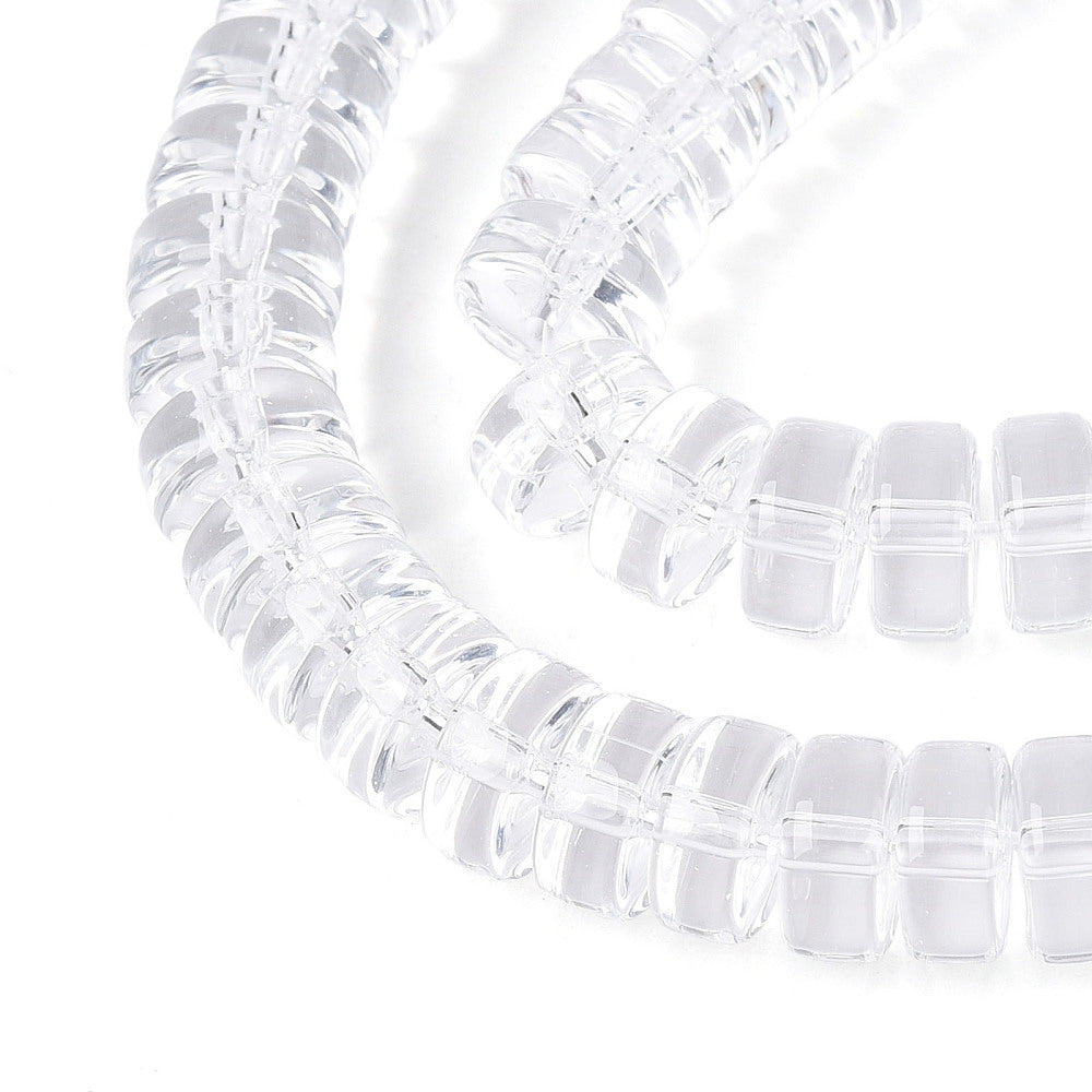 Clear flat round glass beads strand, partial view of bead rows