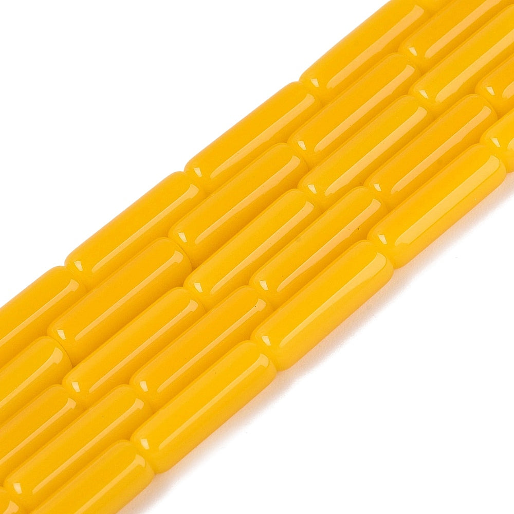 Gold yellow bugle bead strand, glossy tube beads in a straight line