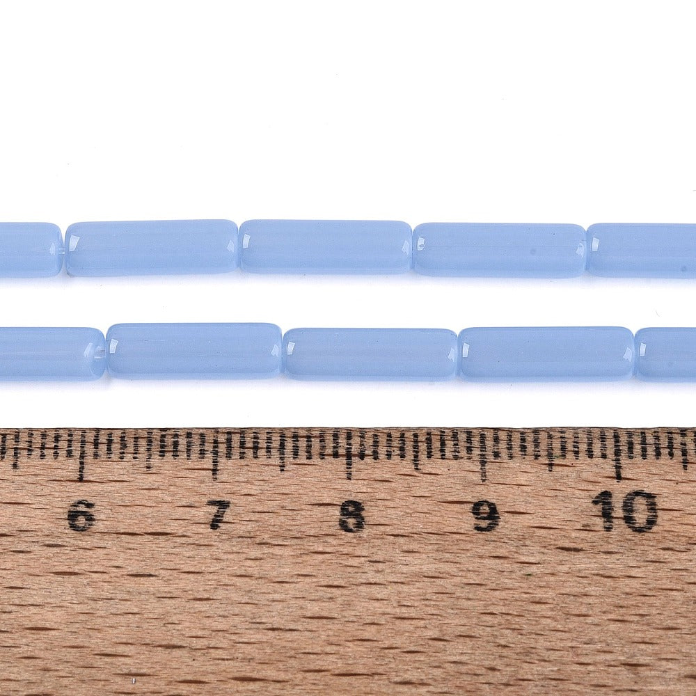 Cornflower blue glass bugle beads strand on ruler, tube beads about 12–13mm