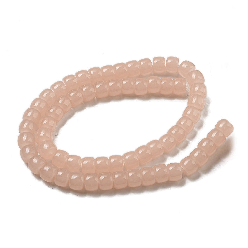 Salmon pink barrel bead strand, round looped arrangement of faceted beads
