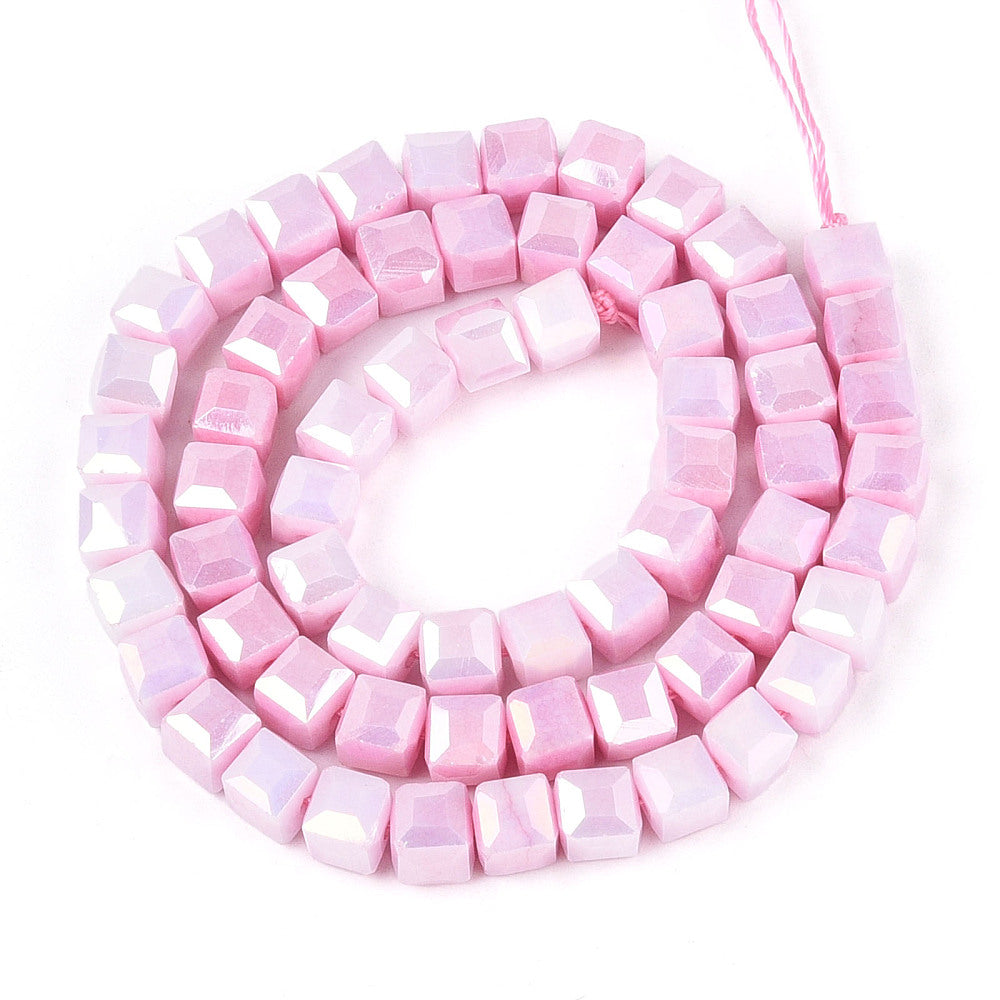 Pink AB cube glass beads strand, looped view of faceted square beads with hole