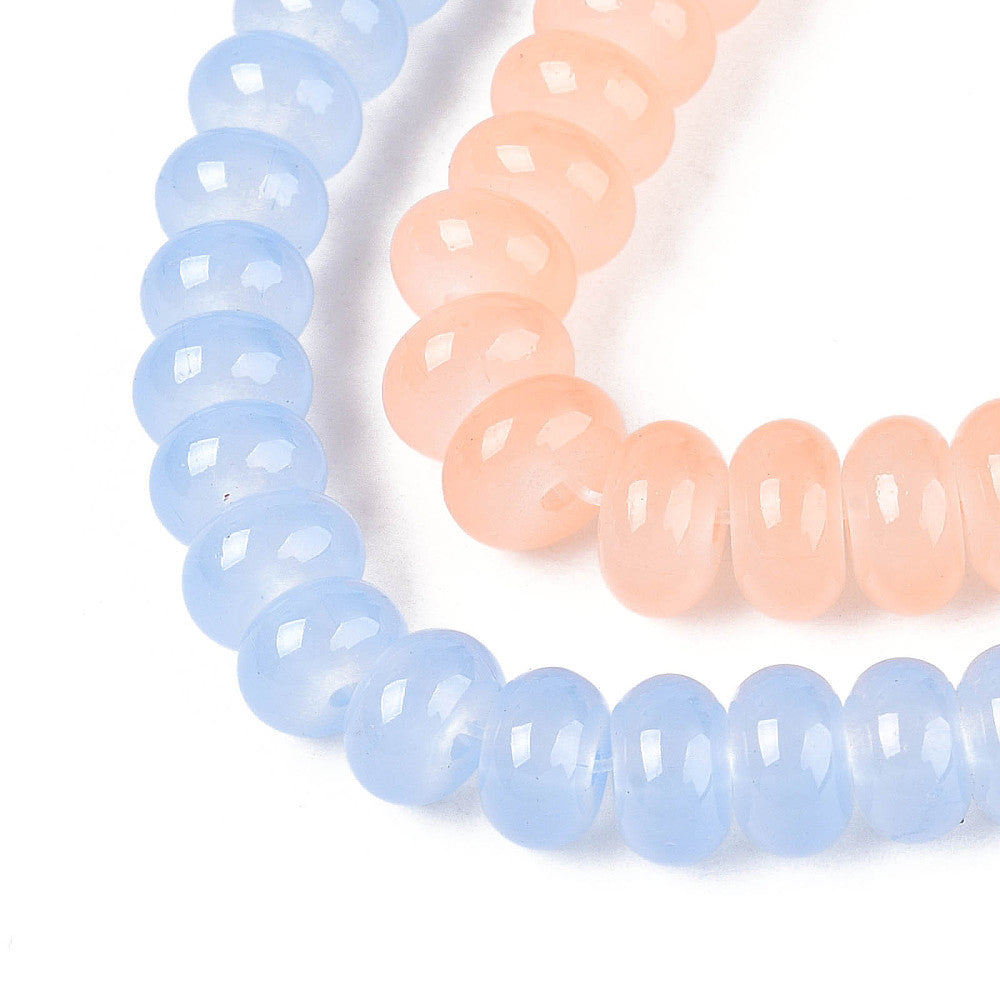Close-up bead strand with glossy light blue and peach round glass rondelle beads