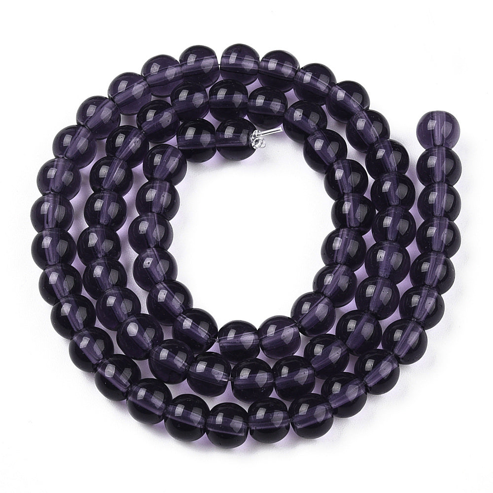 Dark purple transparent glass bead strand bracelet with small silver clasp