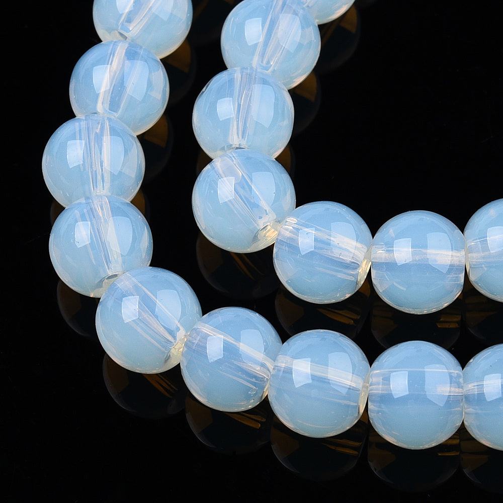 Transparent glass round beads strand, light blue opal-like, circular loop view