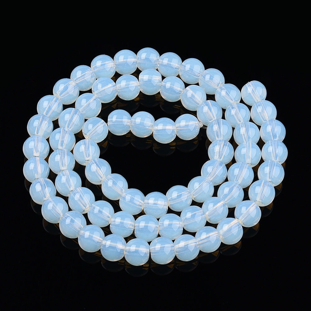 Transparent glass round beads strand, light blue opal-like, double loop with round beads