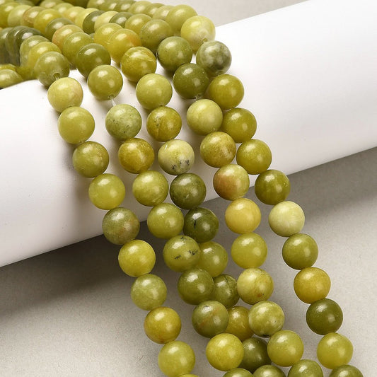 Round jade bead strand in yellow-green tones, 8mm beads, smooth polished finish