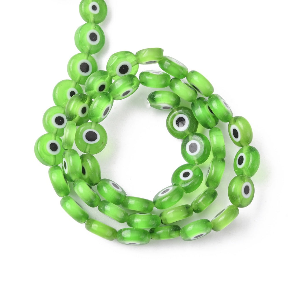 Lime green evil-eye lampwork beads strand arranged in a round loop