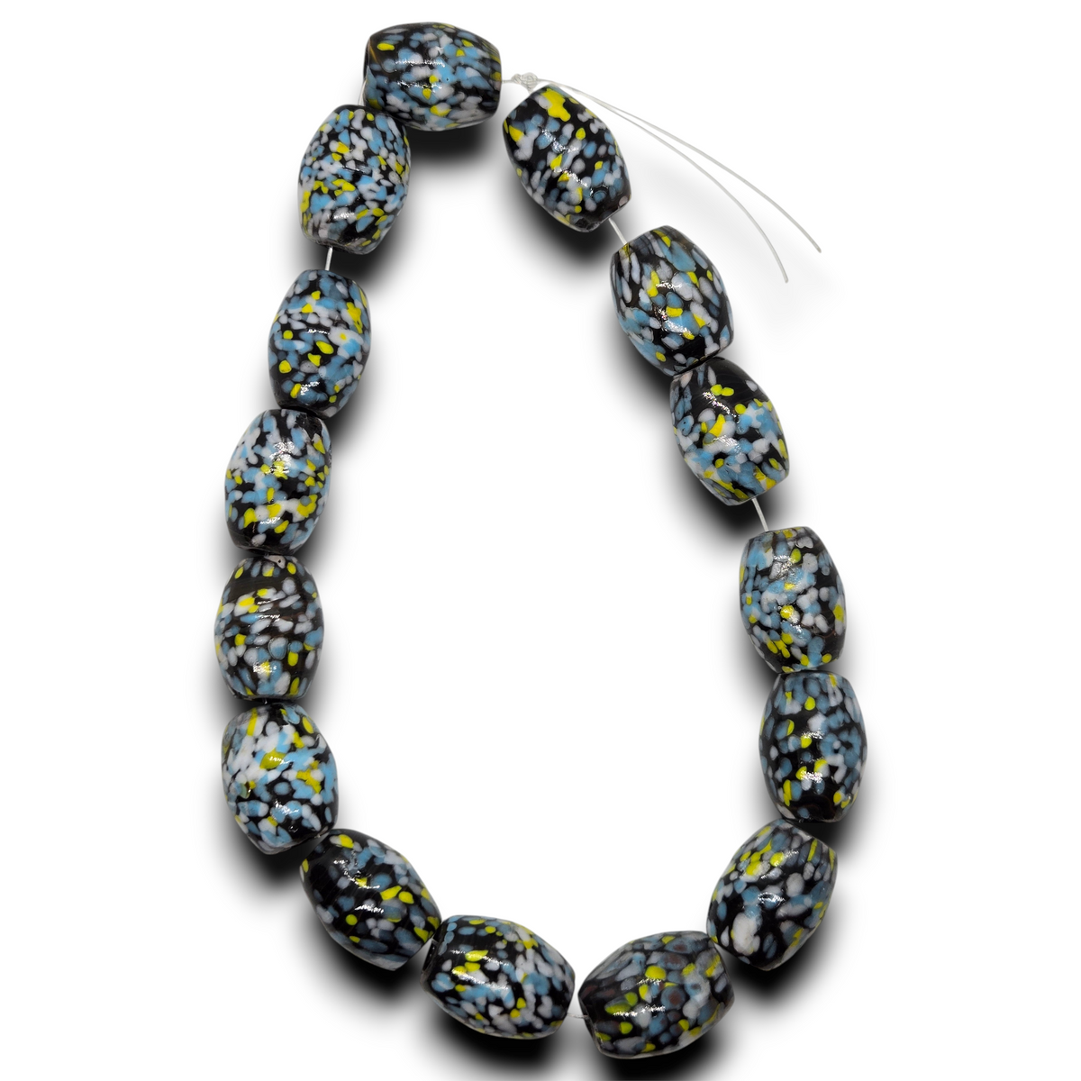 Vintage glass barrel bead strand with black, blue, yellow, and white spotted swirl beads