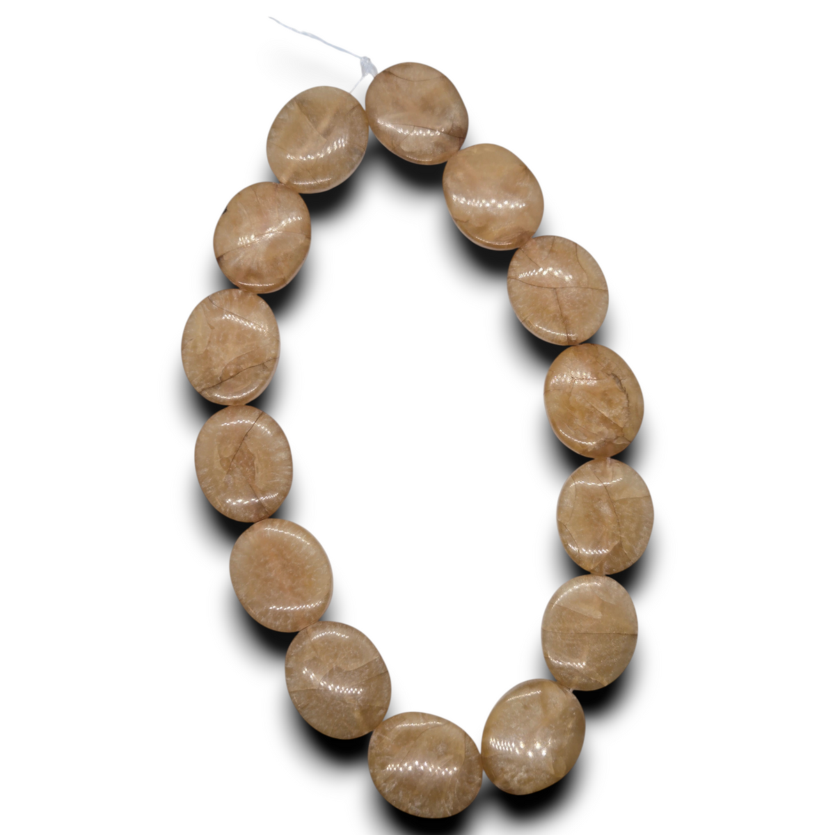 Oval resin beads strand, pale peach, dark crackle texture, smooth rounded beads