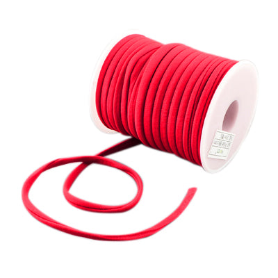 Flat red nylon cord, 5x3mm, wound spool with loose strands