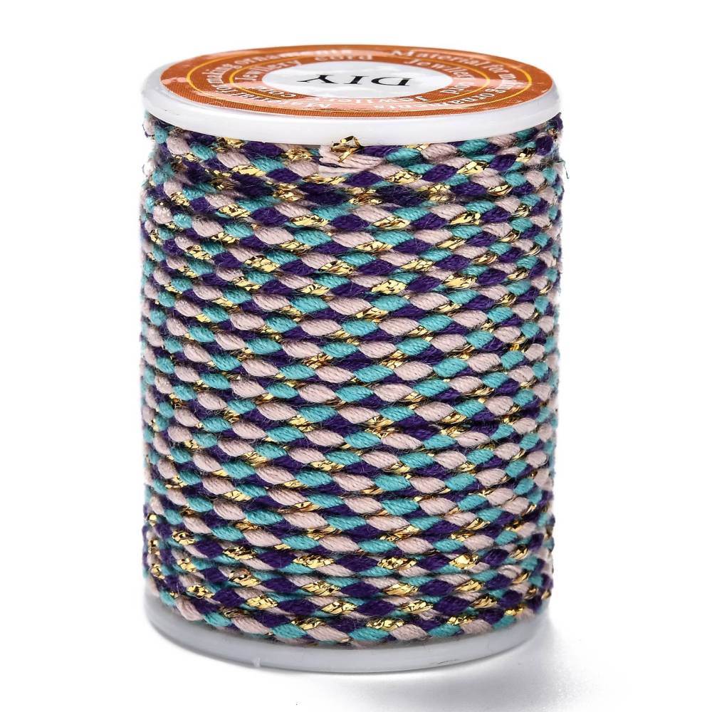 Metallic braided cord roll with purple, teal, and gold threads, tightly wound