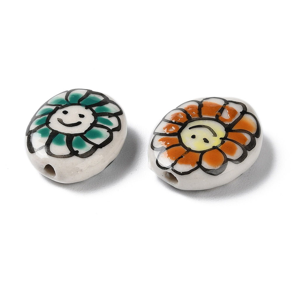 Handmade porcelain oval beads, green and orange flower smiley faces, pair