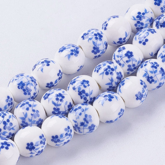 Porcelain round beads strand with white beads and blue floral pattern