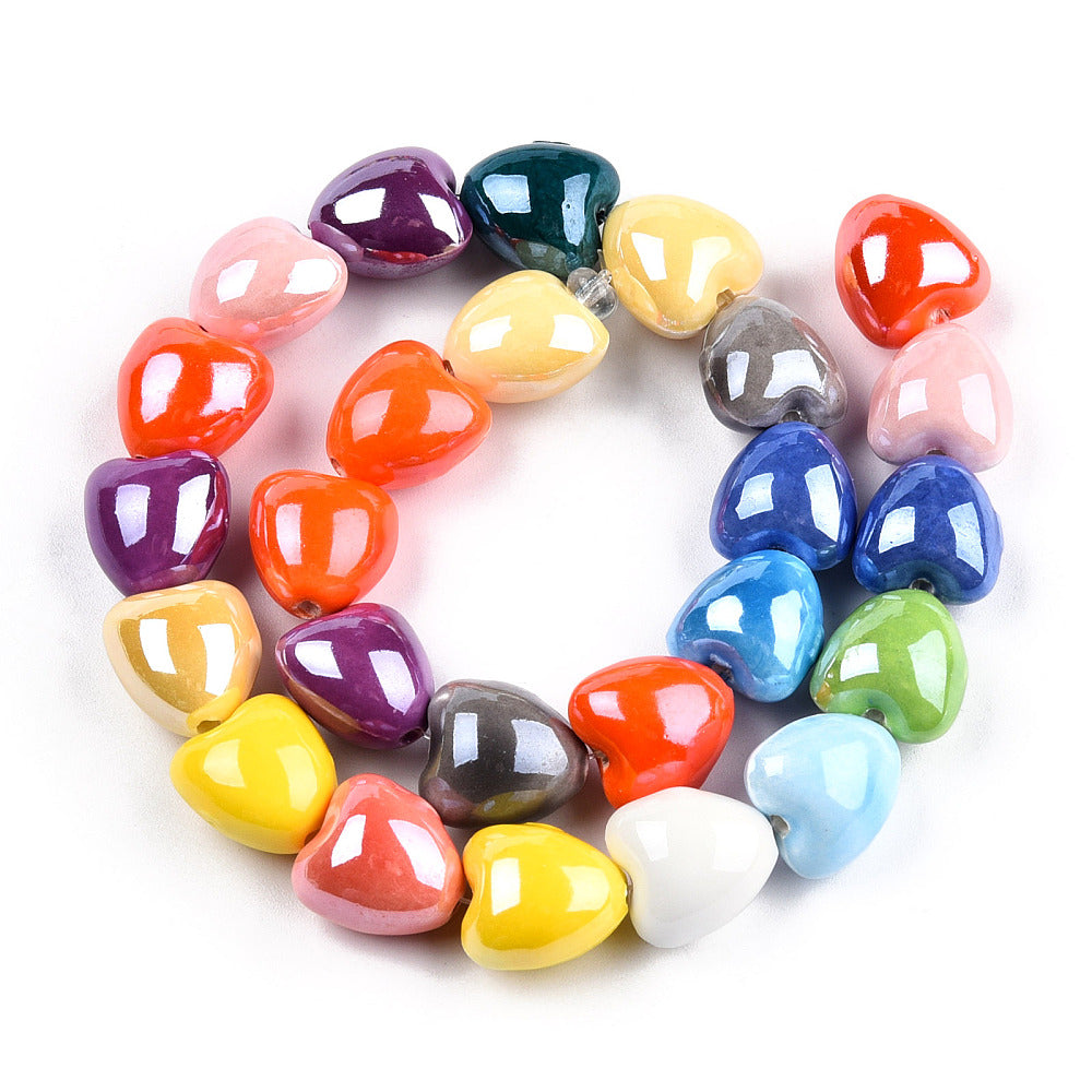 Round heart beads in assorted colors on a circular arrangement, glossy glaze