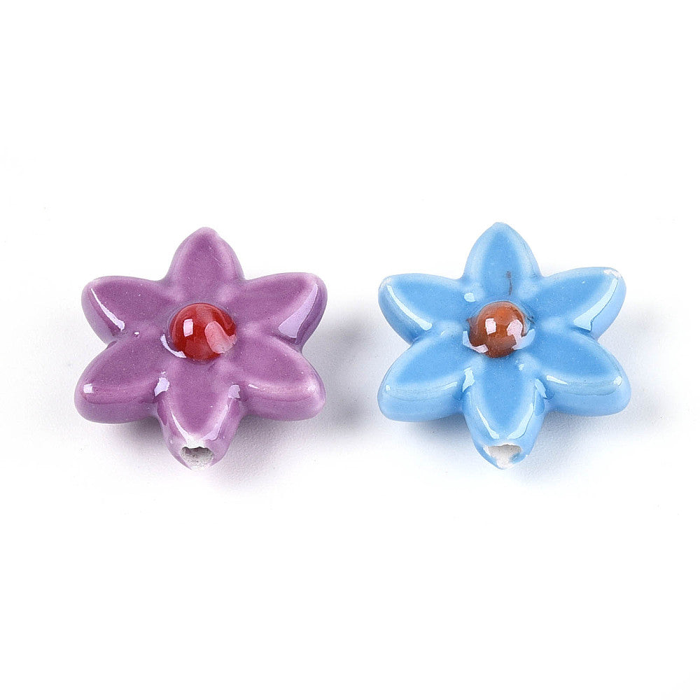 Porcelain flower beads in purple and light blue with red and brown center studs