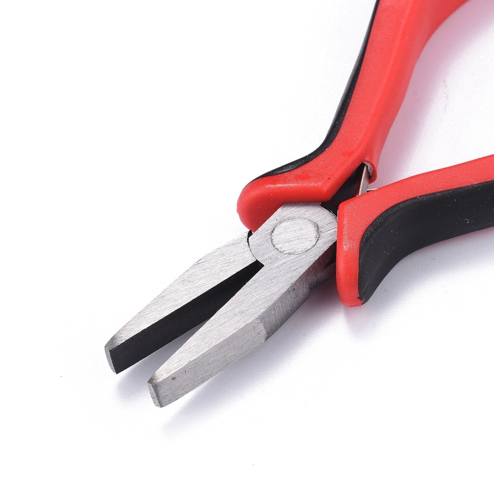 Flat nose pliers close-up of pivot joint and steel jaw tips