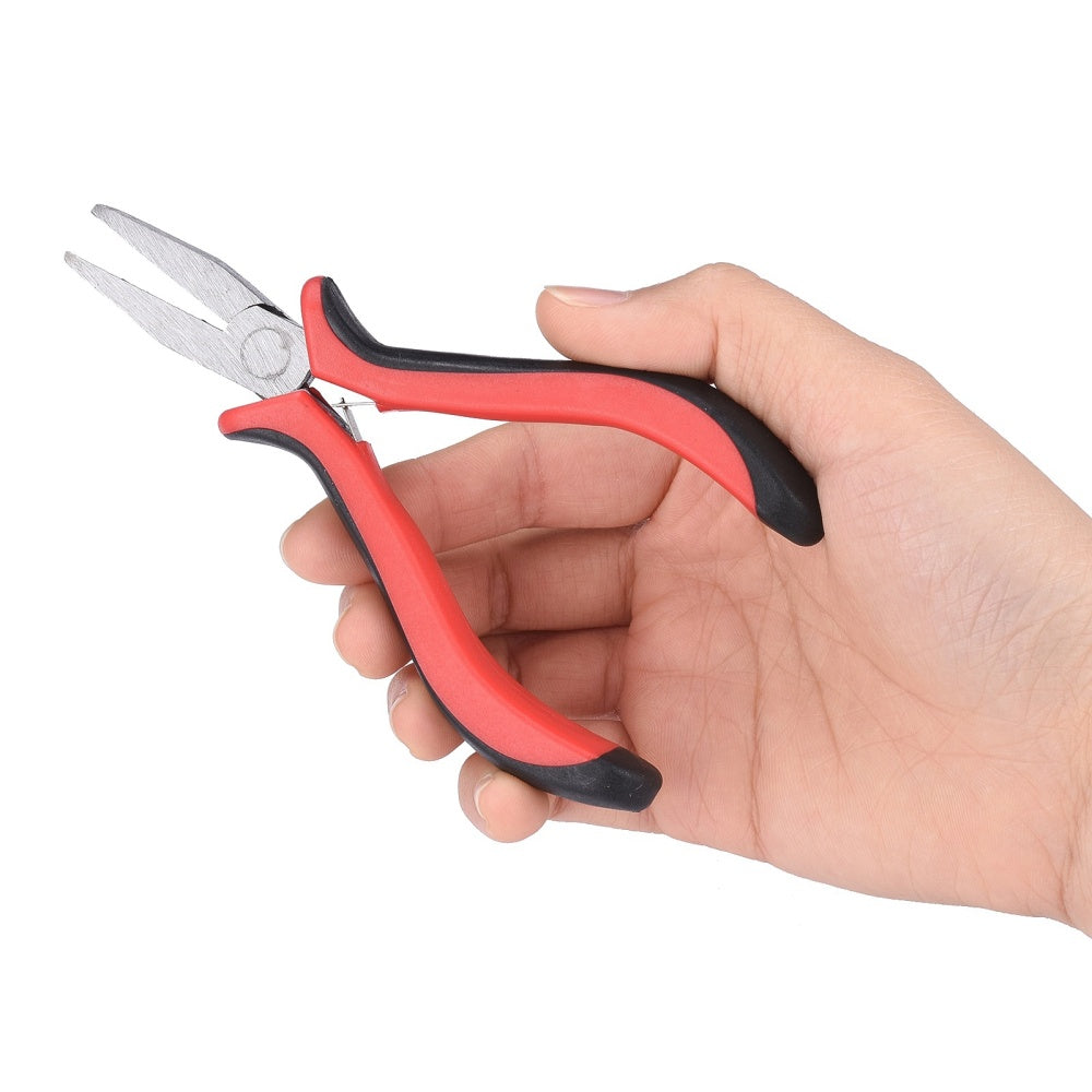 Flat nose pliers held in hand, red and black insulated handles, steel jaws