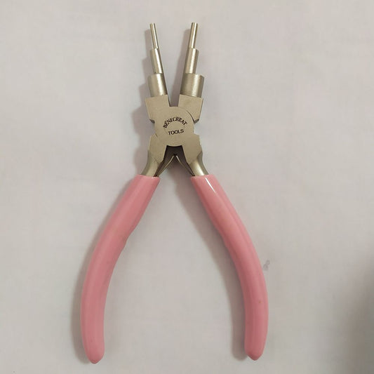 6-in-1 bail making pliers with pink insulated handles and metal jaws