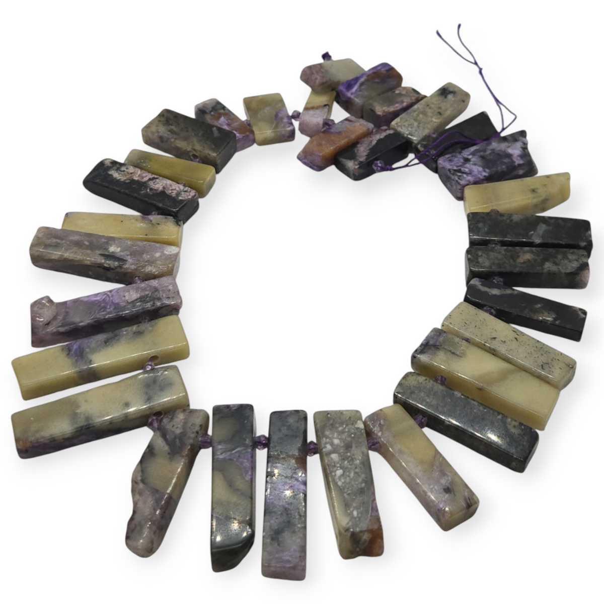 Charoite spike beads strand with purple, black, and olive rectangular stones