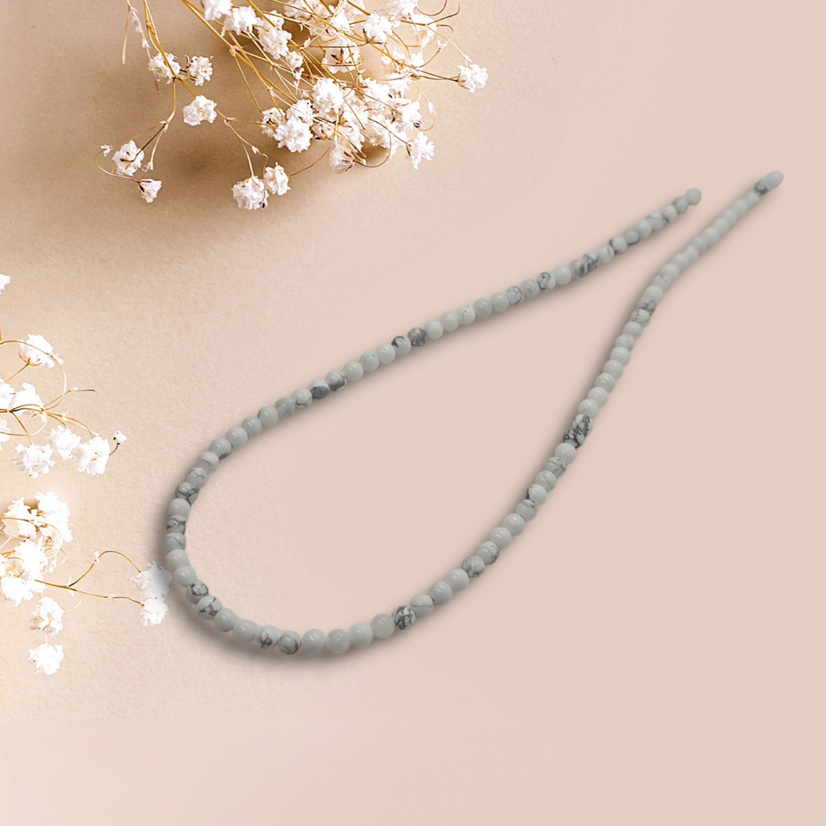 Howlite round gemstone bead strand, pale blue-gray and white beads