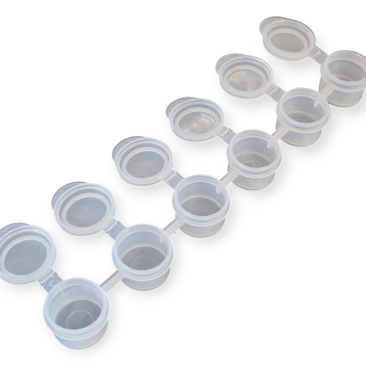 Set of mini empty paint cans with snap-on lids, translucent light blue
