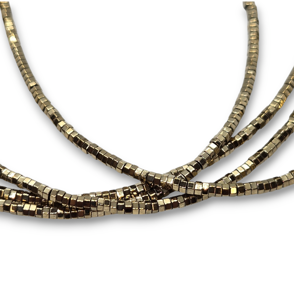 Gold-tone hexagon bead strands with dark metallic rows and bright shine