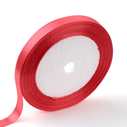 Cerise satin ribbon spool, 10mm wide polyester, neatly wound