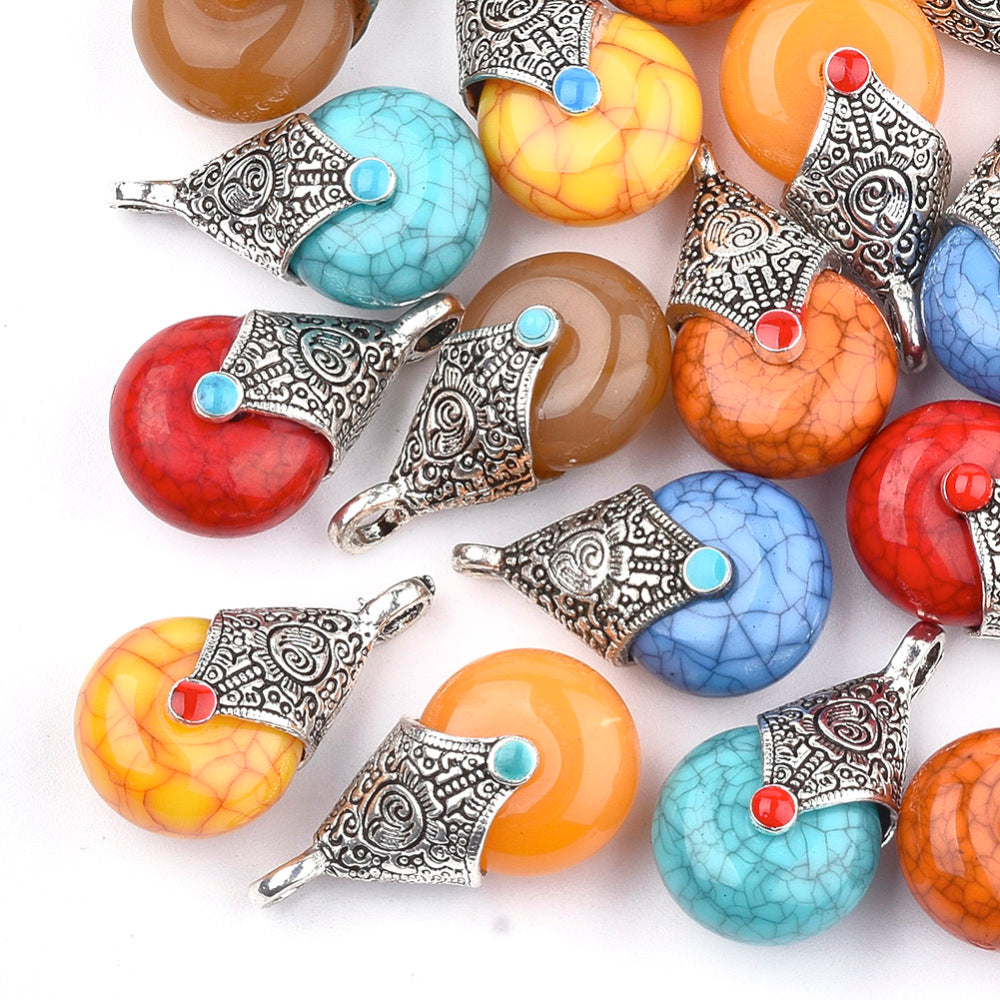 Antique silver teardrop pendants with mixed resin colors and red/blue enamel accents