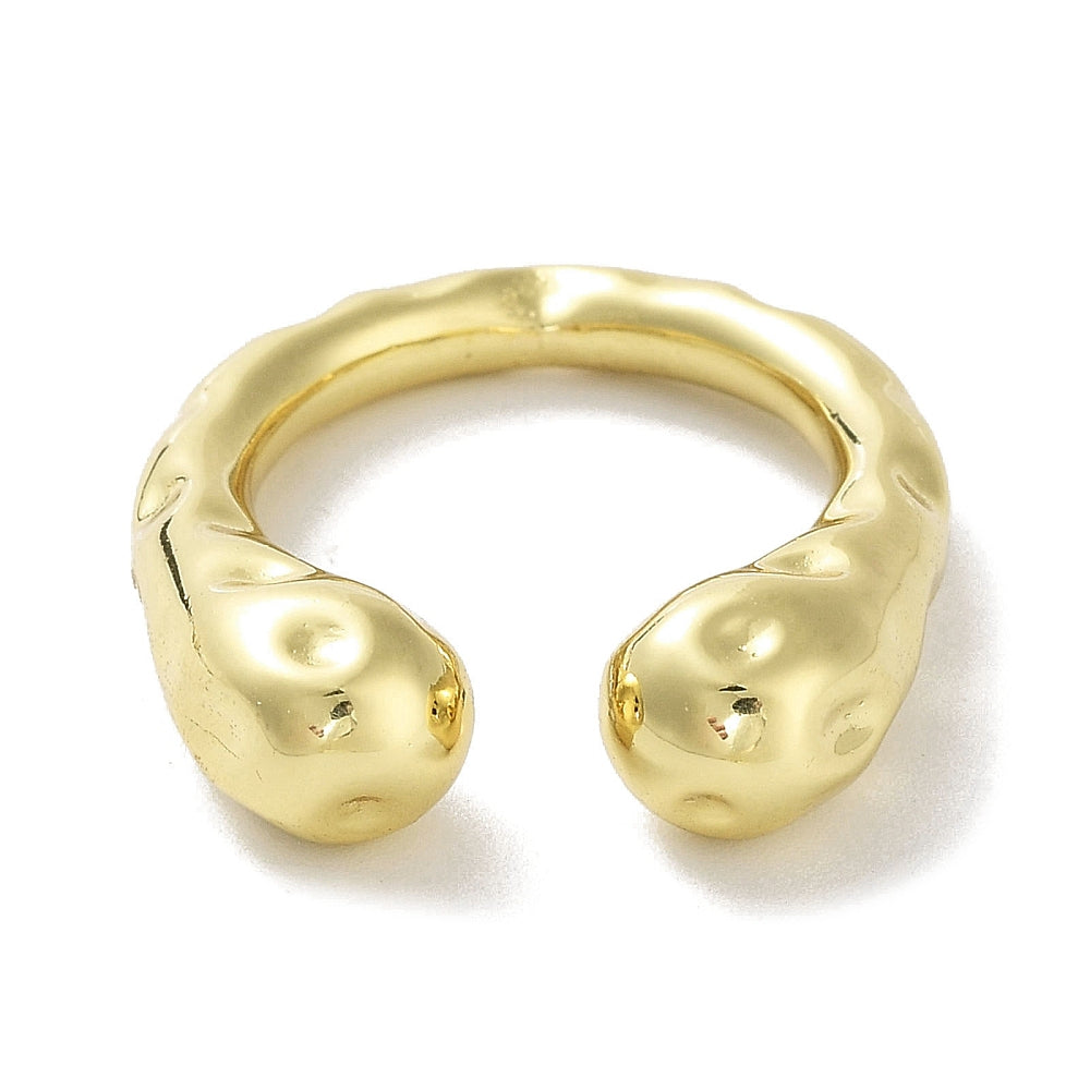 Gold-tone open cuff ring with broad rounded ends and glossy textured surface