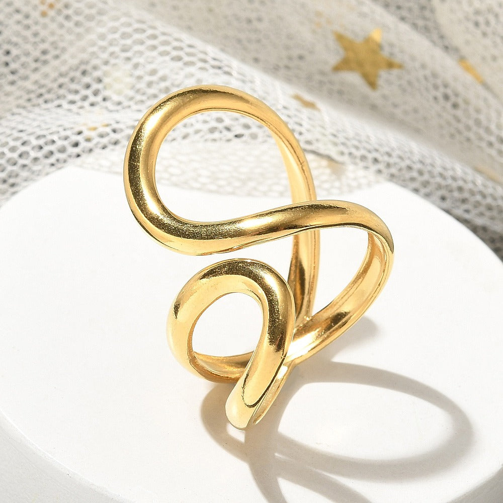 Gold-plated open cuff ring with intertwined loops and smooth round edges