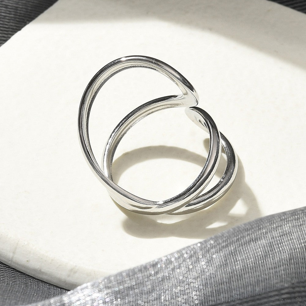 Stainless steel open cuff ring, silver tone, rounded open ends close-up