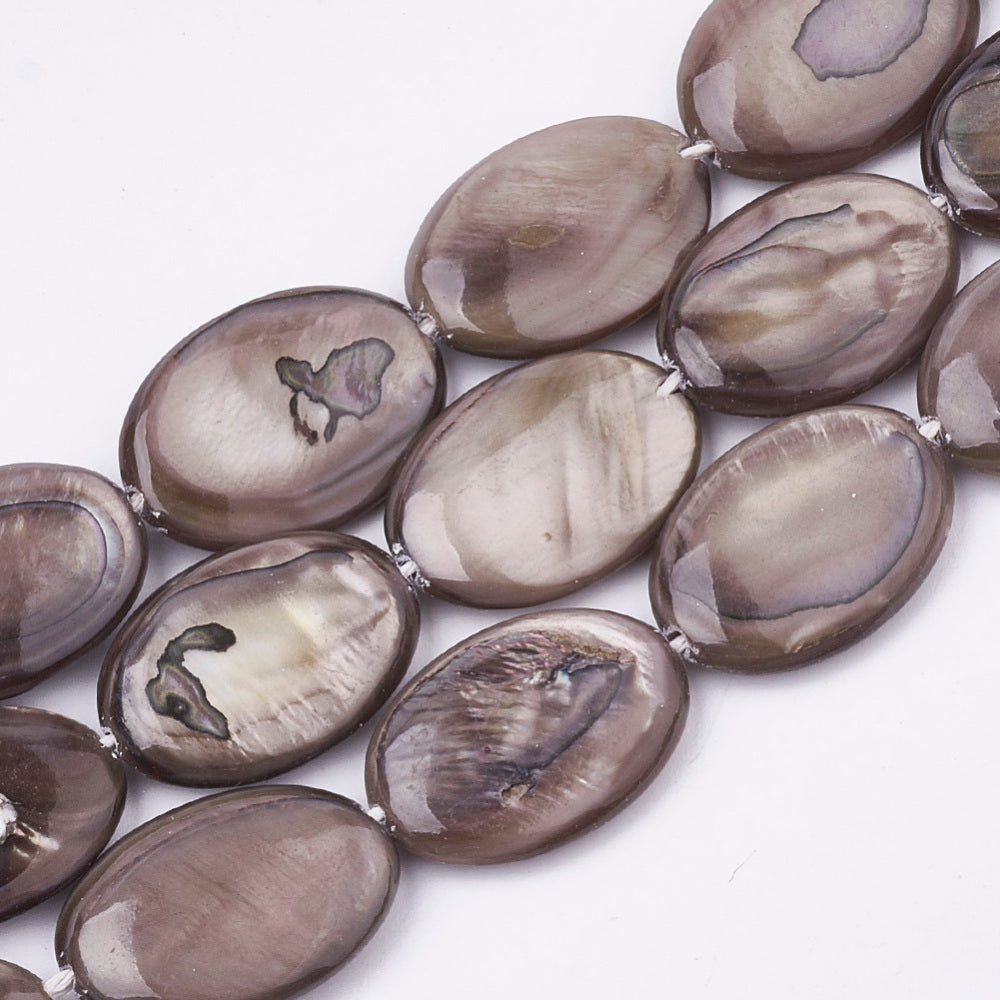 Oval freshwater shell beads strand, mixed smoky taupe and purple, close-up