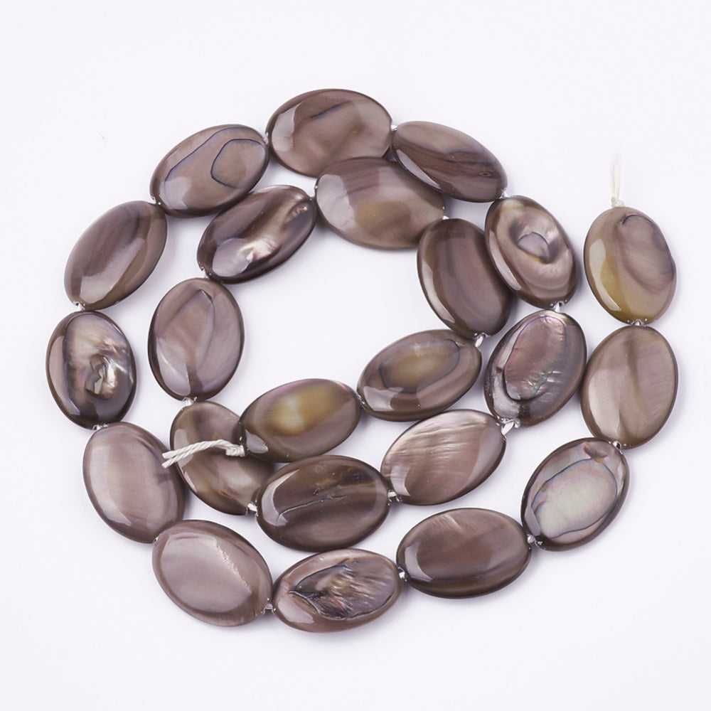 Oval shell bead strand, mixed taupe and purple ovals on visible loops