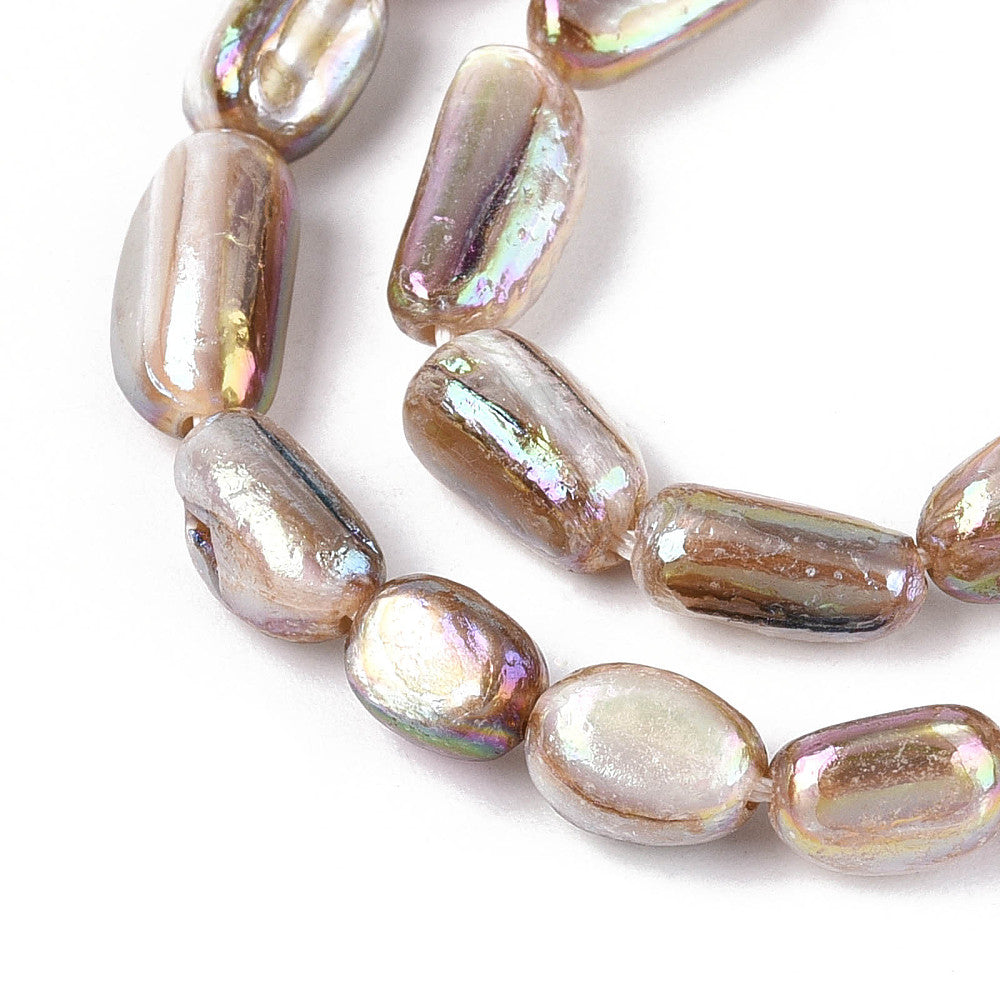 Freshwater shell nugget beads, electroplated, lustrous tan ovals with rainbow sheen