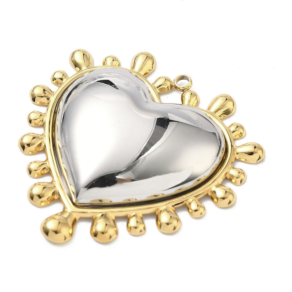 Two-tone heart pendant necklace with mirror-finish silver center and gold-tone prongs