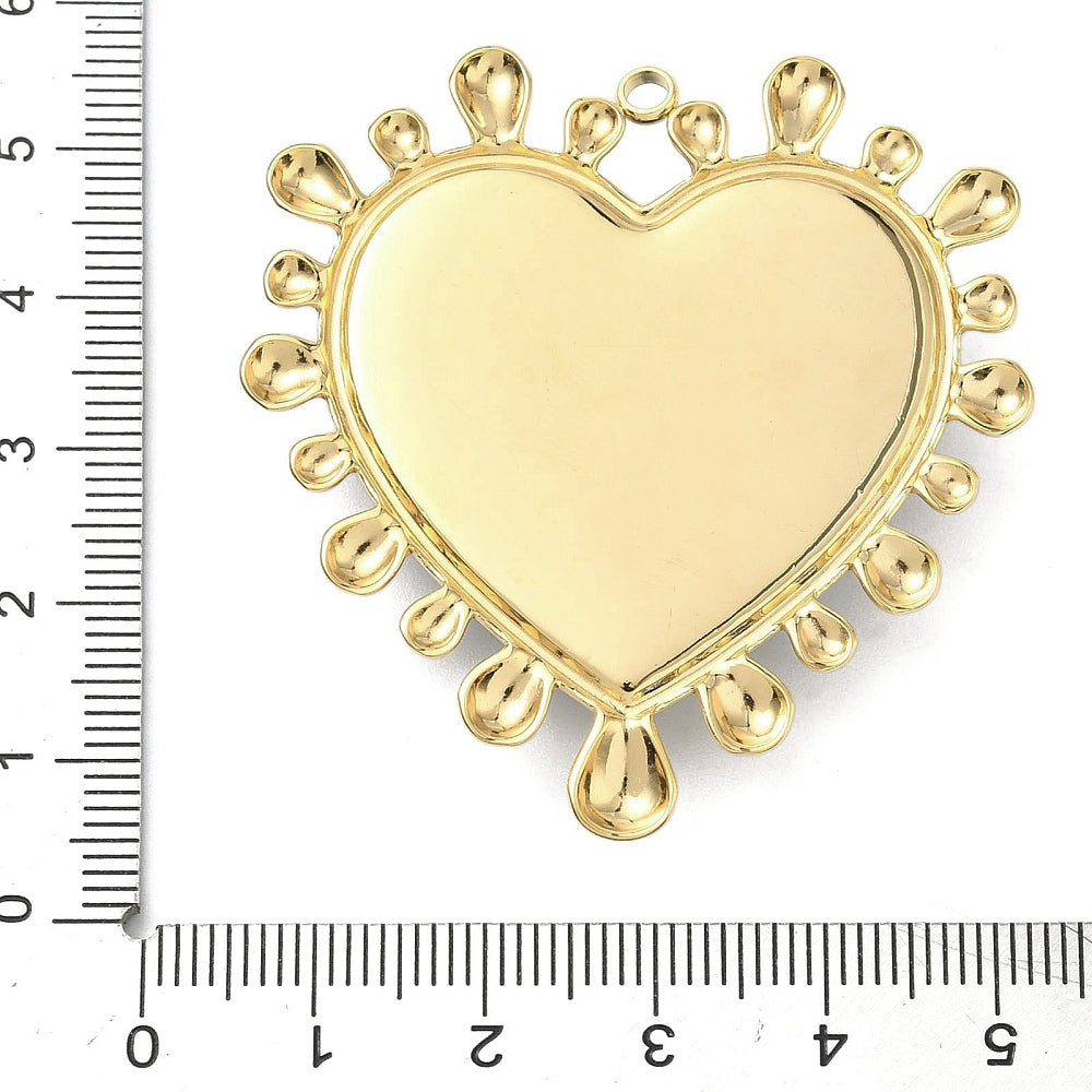 Two-tone heart pendant back, smooth gold-tone finish with rounded petal-like accents