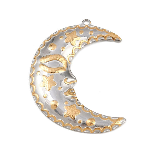 Gold-and-silver crescent moon pendant with floral cutouts and star accents