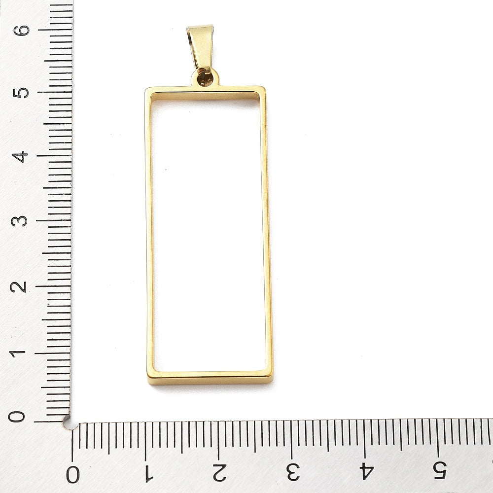 Gold-plated rectangular open-back pendant with top loop and empty resin setting
