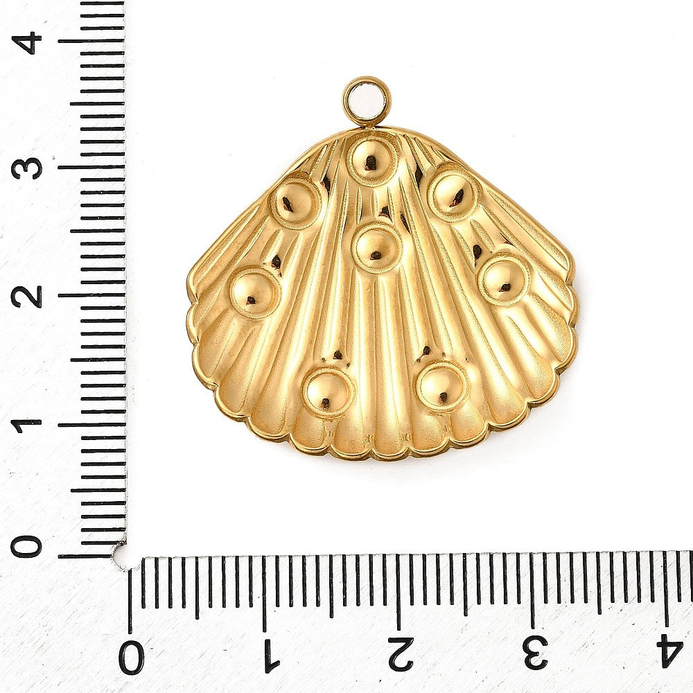 Gold shell-shaped pendant with imitation pearl studs and round top loop