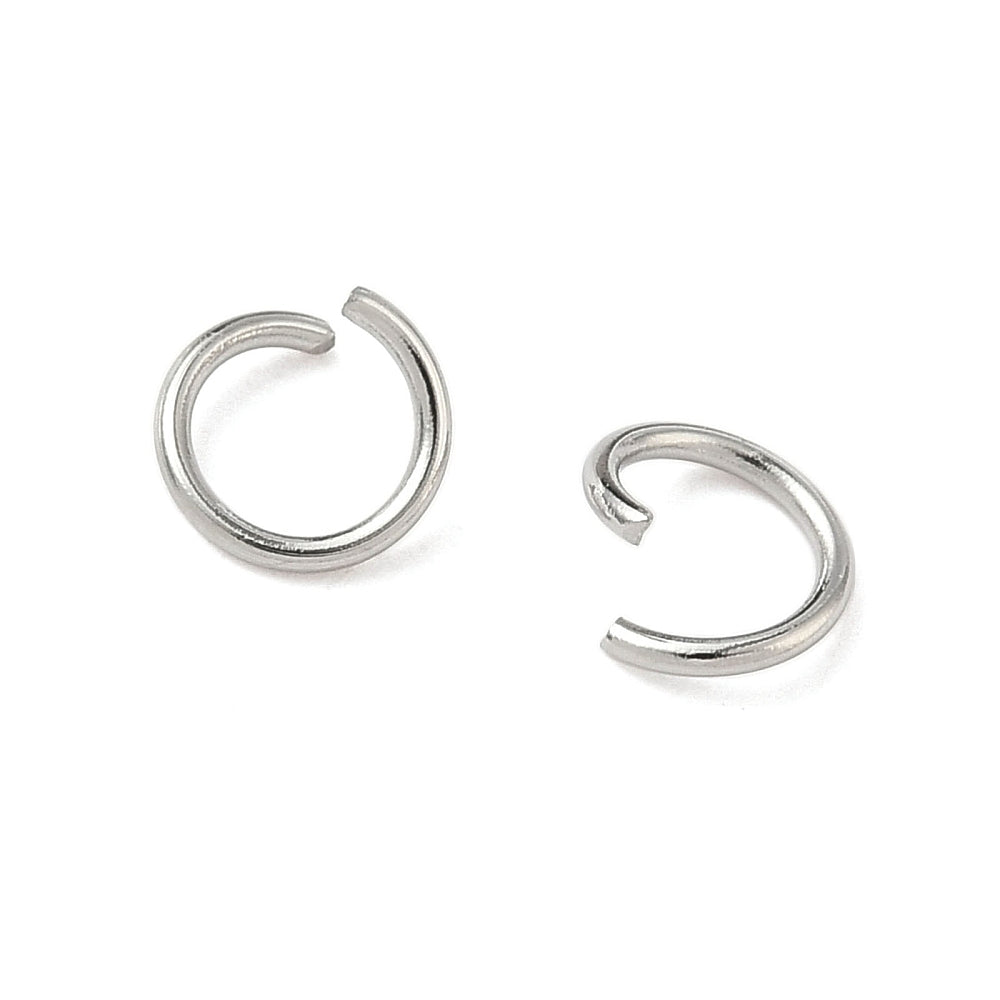 Stainless steel open jump rings in silver tone, two partially open loops