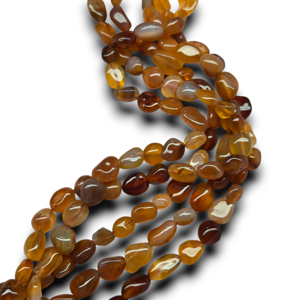 Carnelian smooth pebble beads strand, 7mm, translucent amber and brown.