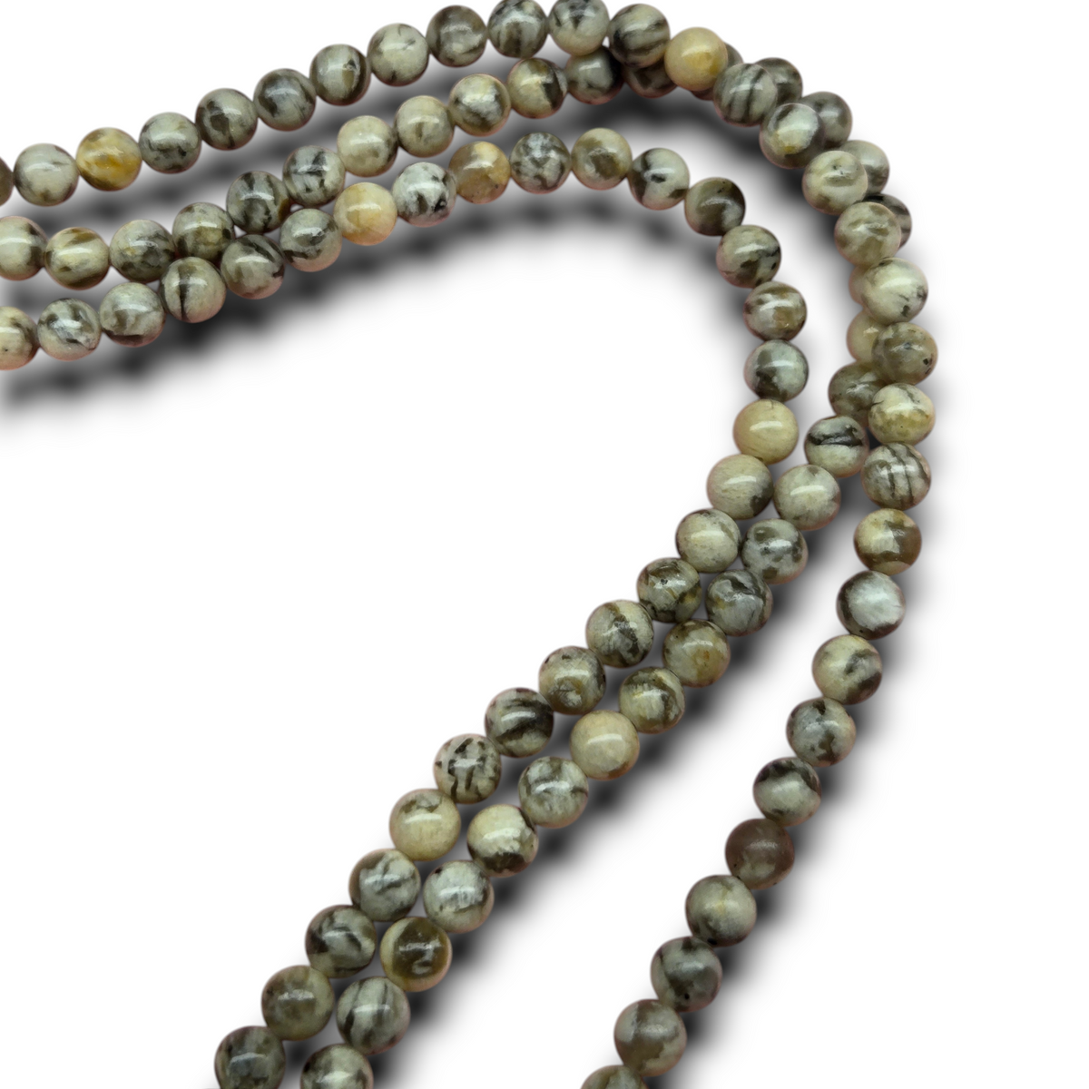 Smooth round feldspar beads strand, 6.5mm, green-gray with light yellow mottling.