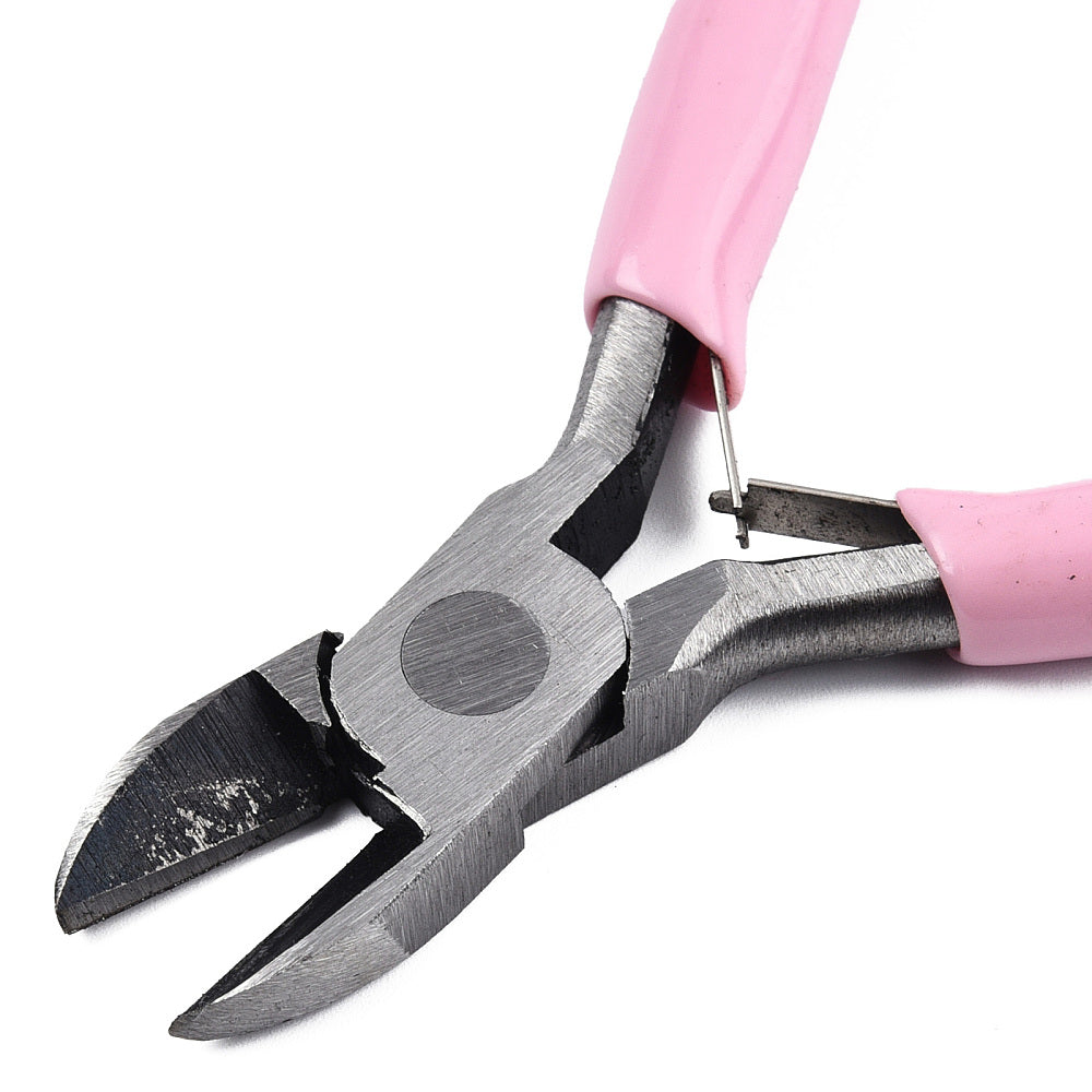 Side-cutting jewelry pliers with pink grips and steel jaws