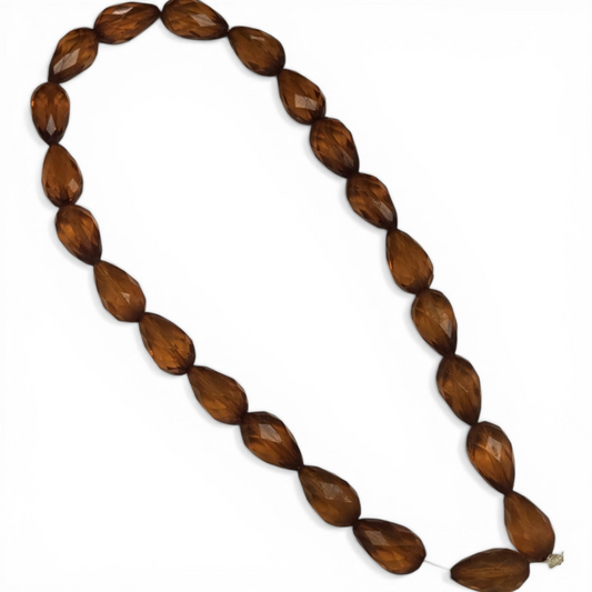 Strand of dark burnt amber faceted teardrop acrylic beads