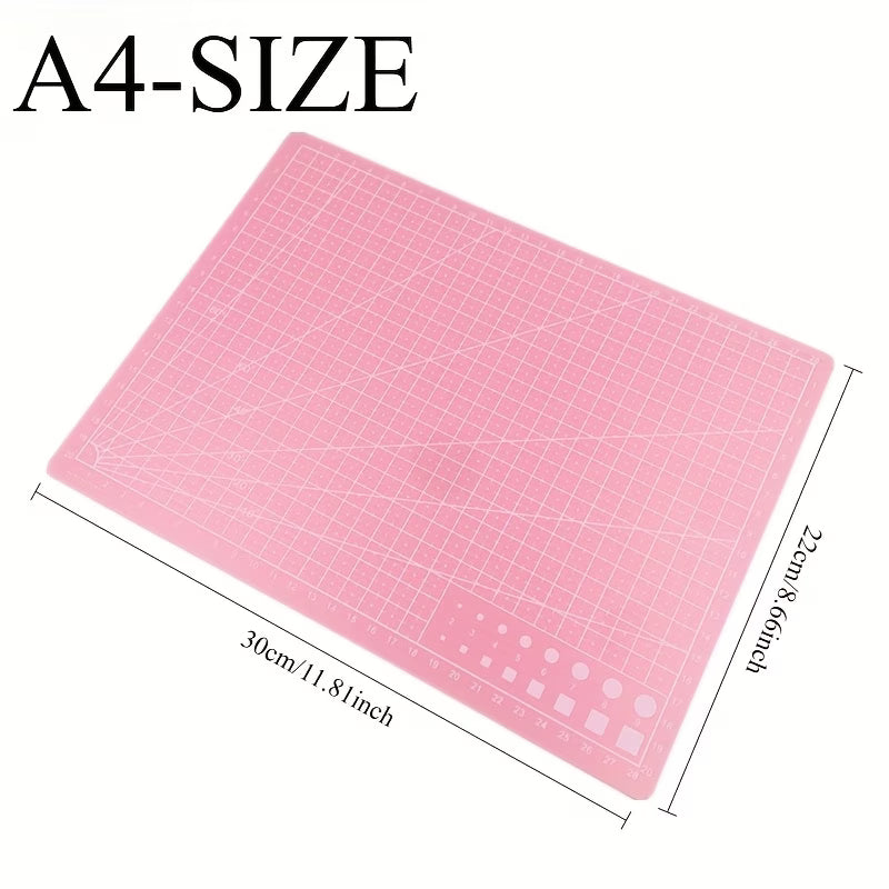 A4 pink self-healing cutting mat with measurement grid, 30cm x 26cm
