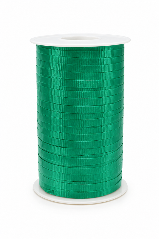 Green curling ribbon spool with tightly wound ribbon for gift wrapping and crafts