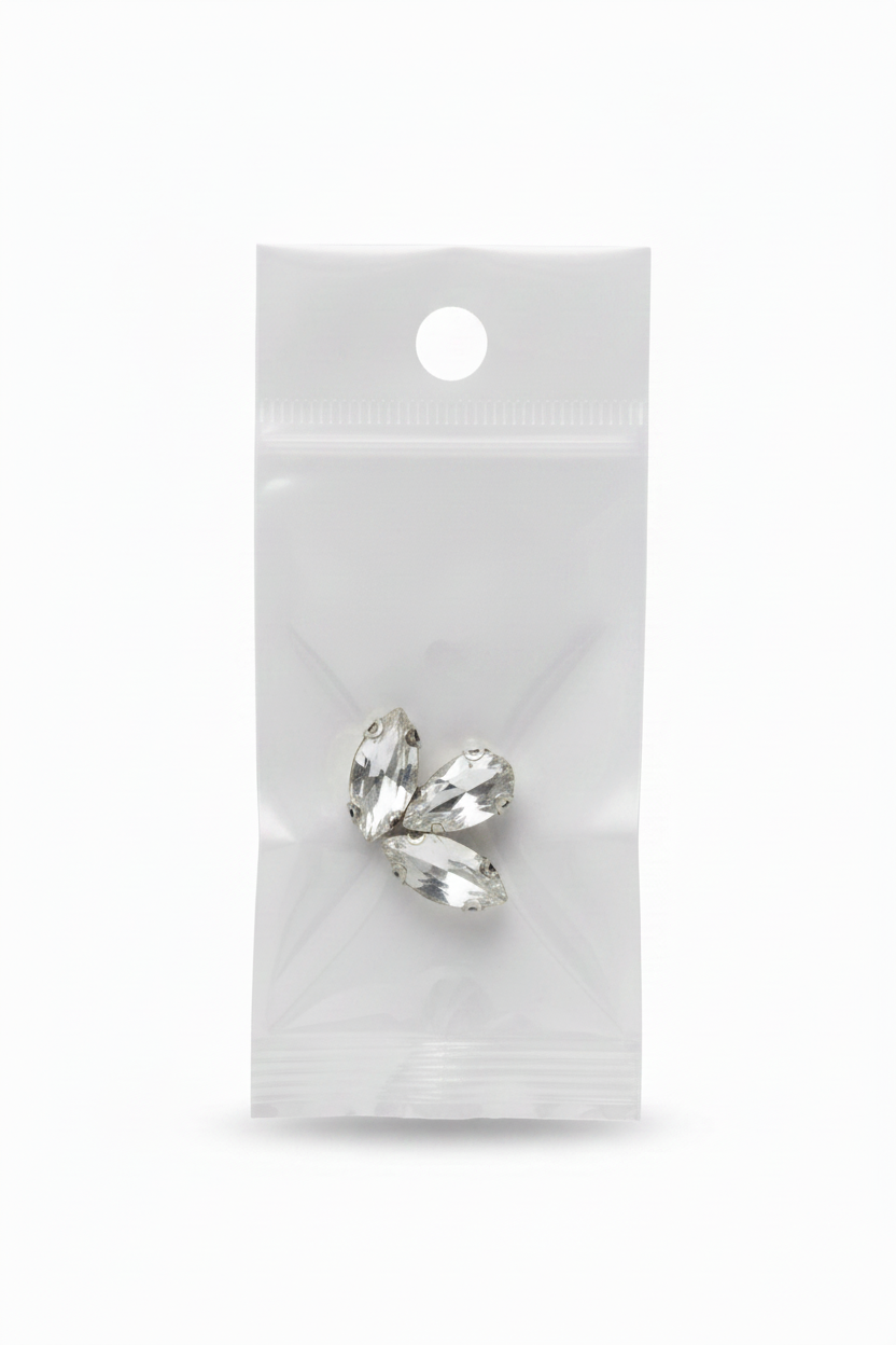 Silver rhinestone bow applique with glass crystal accents, flat back