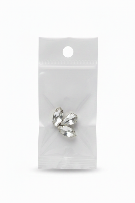 Silver rhinestone bow applique with glass crystal accents, flat back
