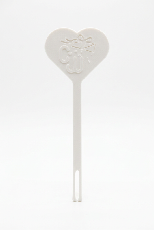White paracord threader with heart-shaped handle and embossed cord opening